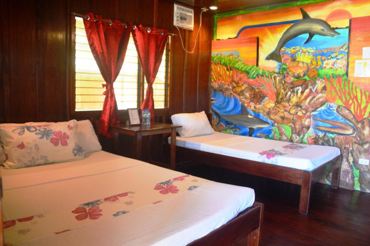 Ausan Beach Front Cottages Barton Ngoại thất bức ảnh